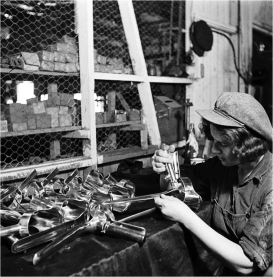 Production of vaginal specula for farm animals, Kibbutz Ein-Harod, circa 1940.  Source: Israel State Archives/TS-38/10815.