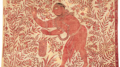 herb picker in ceremonial cloth in red 