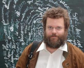 Manfred Laubichler in front of a chalkboard